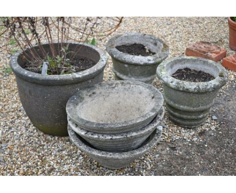 A trio of weathered cast stone planters to/with another pair and a large single planter (6) 