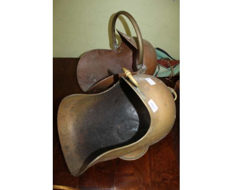 TWO METAL HELMET SHAPED COAL SCUTTLES 
