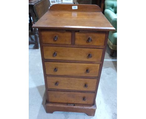 A small Victorian  walnut chest of two short over four long drawers on bracket feet. 16' wide