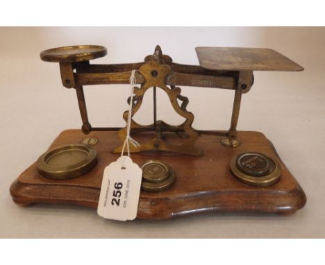 A Victorian set of gilt brass postal scales