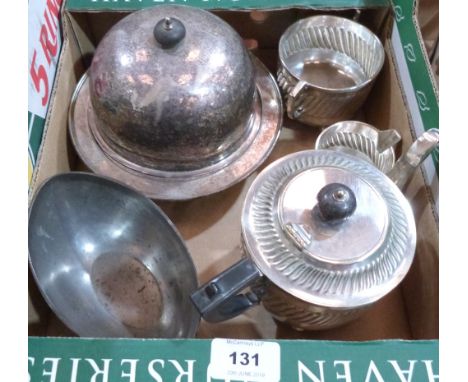 A plated three piece tea service, a muffin dish, stand and cover and a Danish navette pewter bowl 