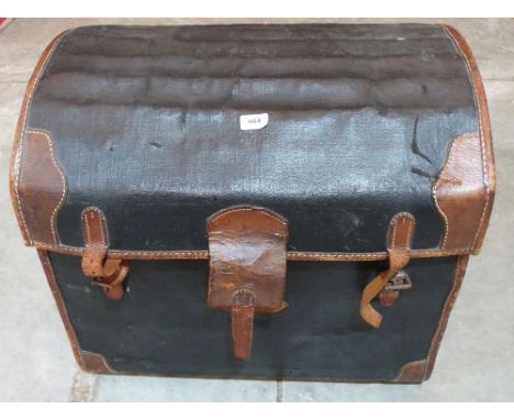 A canvas and leather dome top cabin trunk by W.M. Install &amp; Sons