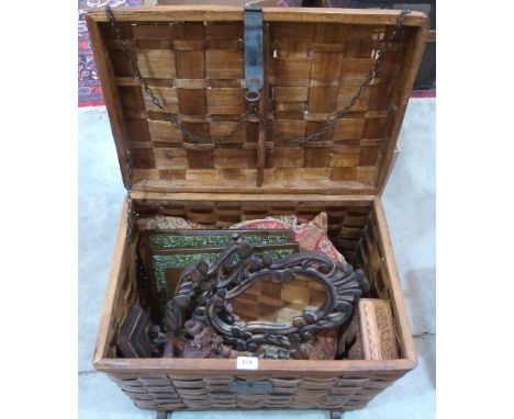 A woven lath box containing various items of treen and a large tapestry cushion