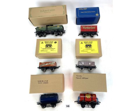 6 assorted 0 gauge rolling stock inc. 2 x Bassett Lowke 7-plank coal wagons, 1 x Darstaed BP Petroleum Spirit tank wagon, 2  