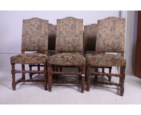 A set of 6 19th century walnut Osso Bucco French dining chairs having shaped legs and crinoline stretchers with overstuffed s