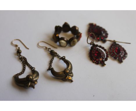  A Victorian yellow metal and ruby garnet stone inset earrings and necklace pendant set together with a pair of yellow metal 