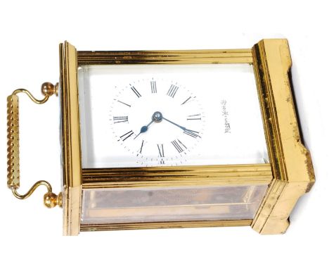 A 20th century Mappin & Webb carriage clock / timepiece - glazed all sides and top signed white enamel face in running order.