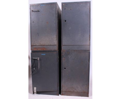 A set of 4 large factory industrial mid 20th cenutry  vintage Industrial lockers with internal shelves in grey finish