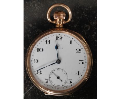 A stunning early 20th century ( full working order ) 9ct gold Omega open face pocket watch. The ceramic dial with roman numer