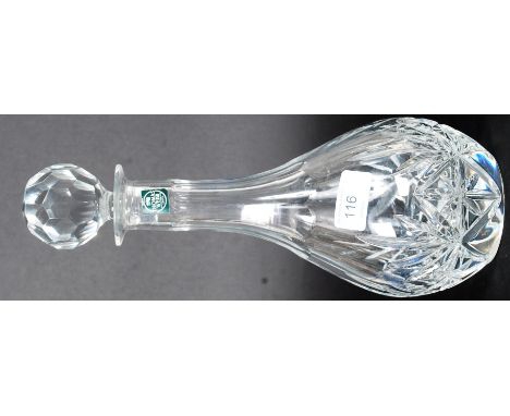 A cut lead glass crystal decanter by Thomas Webb retaining original makers sticker to the front of the decanter