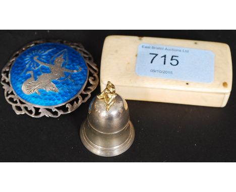 A hallmarked contemporary silver snuff bottle with teddybear atop, along with a white metal brooch and carved bone trinket bo