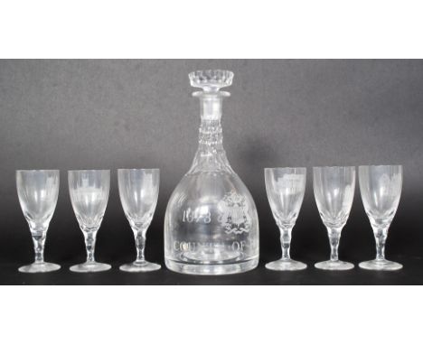 A Bristol 600 Celebrations commemorative decanter and 6x drinking glasses sets.