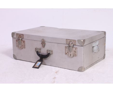 A vintage 20th century unusual pressed polished metal aluminium gentlemans suitcase having hinged top with carry handle. H24 