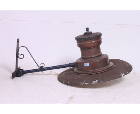 A large  vintage Industrial large Sugg ? Railway Platform Lamp having copper surround being set on rococo cast metal arms. Pu