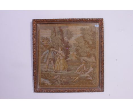 A 19th century tapestry needlepoint sampler being framed and glazed depicting a classical scene