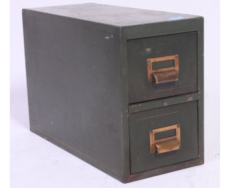 A  vintage 1950's industrial metal twin drawer office desk top filing cabinet in green, the drawers with notation slides. H34