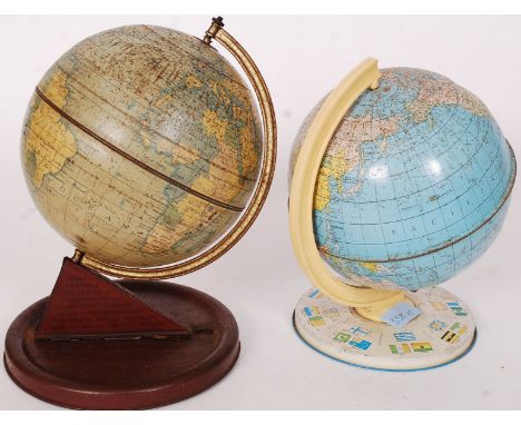 A vintage Chad Valley tin globe on a faux wood tin base, with instructions for the Clock settings along with another vintage 