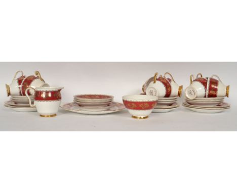 An Edwardian style Gladstone red, white and gilt painted leaf pattern tea service.