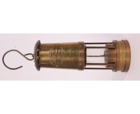 A vintage brass Miners lamp with makers plaque E. Thomas and Williams Aberdare