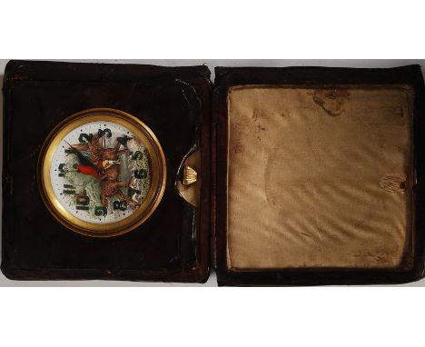 A vintage swiss made leather cased travel clock having hunting scene and subsiduary seconds dial