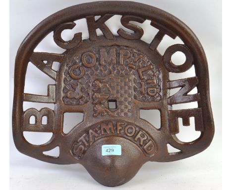 A vintage style ' Blackstone ' tractor metal seat, with pierced backseat decoration