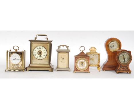A good collection of 7x vintage assorted clocks, to include a British Limited Clock Co brass carriage clock, a brass cased ma