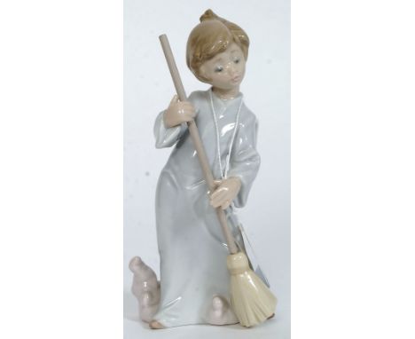 A Lladro figurine ' Sweep Away The Cloud ' Model No 5726 impressed factory marks to base, blue stamp to base. Measures 17 cms