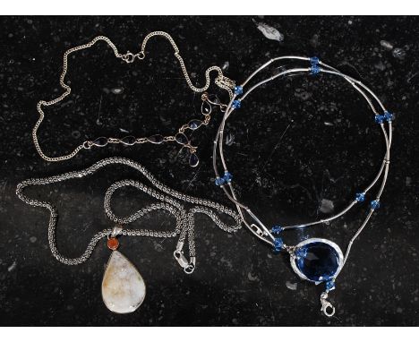 A  good ladies contemporary silver necklace having a quartz inset teardrop pendant. Together with another silver necklace wit