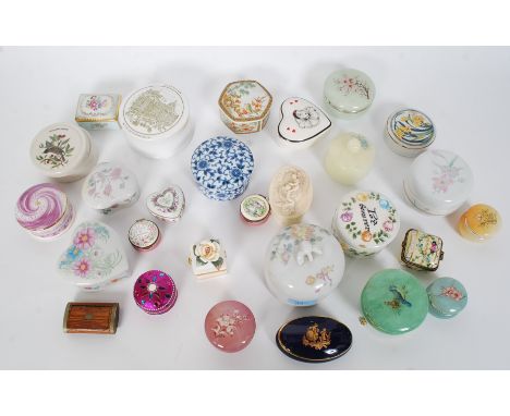 A large collection of assorted ceramic and other trinket boxes