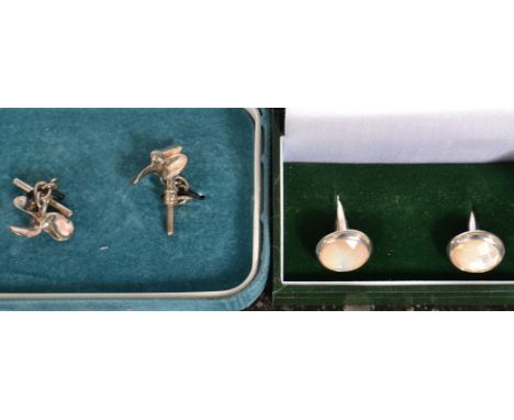 2 sets of vintage gentlemans silver cufflinks. Both stamped 925, one pair in the form of propellers with bars. Both in cases.