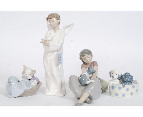 A collection of 4 Nao by Lladro figurines to include Boy With Angel No 1261, Girl Sat With Cat in Lap on Hay Bale, Two Dogs i