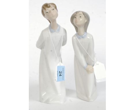 2 Lladro figurines ' Boy Blowing Kiss ' &  ' Girl Kissing 'Impressed factory marks 4869 & 4873 respectively to base also bear