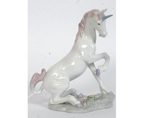 A Lladro Privilege porcelain figurine ' Magical Unicorn ' Model no 7697 impressed along with blue printed marks. Designed by 