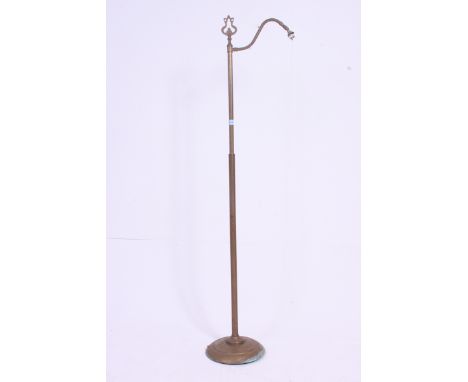 An early 20th century brass standard lamp with terraced base having upright stem and arm above. H149 x W27 cm 