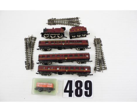 Lima N Gauge LMS 4F locomotive and rolling stock: comprising an unboxed maroon locomotive no 4683 and tender, three LMS coach