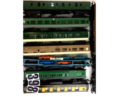 A collection of OO gauge Rolling Stock and Buildings by Hornby Lima and others: including 5 SR green coaches, 1 LNER teak, 9 