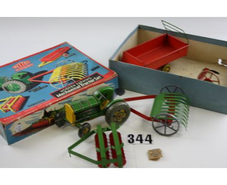 A Mettoy  Playthings Tinplate Modern Farming  Mechanical Tractor Set, comprising clockwork Tractor, Trailer, Disc Harrow, Mow