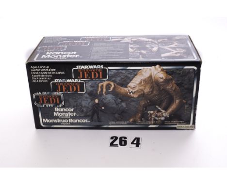 A Vintage Star Wars ROTJ Rancor Monster, in original Palitoy tri-logo box, VG-E, box VG, minor tape damage