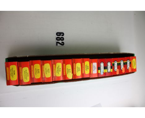Hornby OO Gauge Freight stock: Fifteen assorted 4-wheel wagons including United Dairies tankers (6), 'Redline' tanker, 'Barro