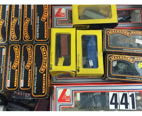 A box of OO Gauge rolling stock by various makers: including four LMS maroon coaches by Mainline (in non-original boxes), fou