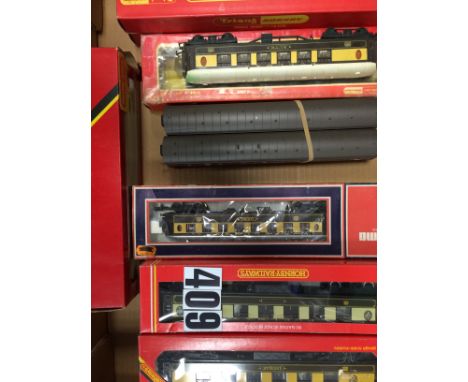 OO Gauge Pullman Coaching Stock by various makers DMU Centre car and two from 'Harry Potter': comprising eight Pullman cars b