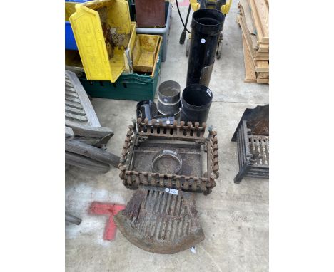 AN ASSORTMENT OF FIRE SPARES TO INCLUDE A GRATE AND FLU PIPE ETC