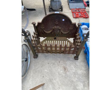 A DECORATIVE CAST IRON FIRE GRATE