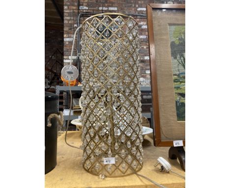A LARGE TABLE/FLOOR LAMP WITH GLASS DROPLET DECORATION