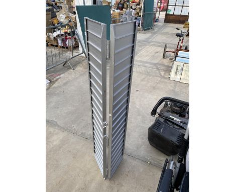 AN ALUMINIUM FOLDING WHEELCHAIR RAMP