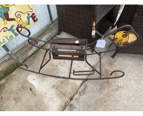 A SCRATCH BUILT WOODEN AND METAL CHILDS ROCKING HORSE