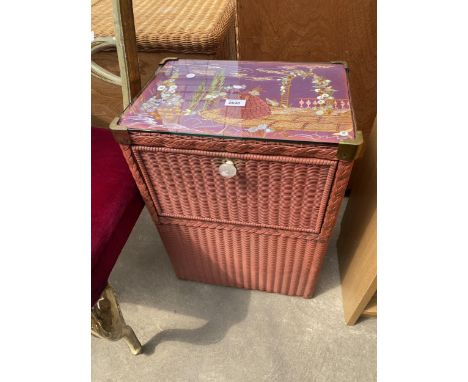 A LLOYD LOOM LINEN BOX WITH SILKWORK TOP DEPICTING GARDEN SCENE