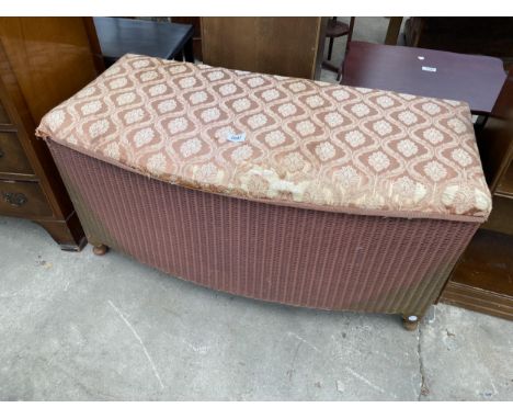 A LLOYD LOOM OTTOMAN