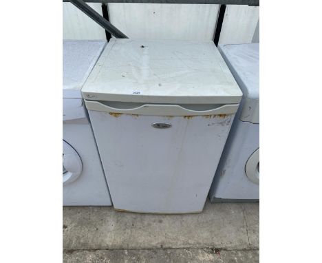 A WHIRLPOOL FRIDGE