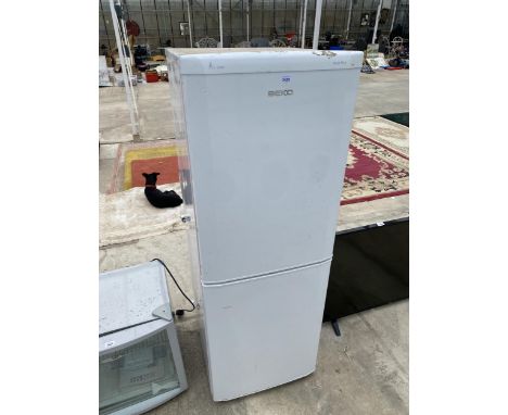 A WHITE BEKO UPRIGHT FRIDGE FREEZER